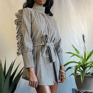 Printed black and white ruffle shirt dress